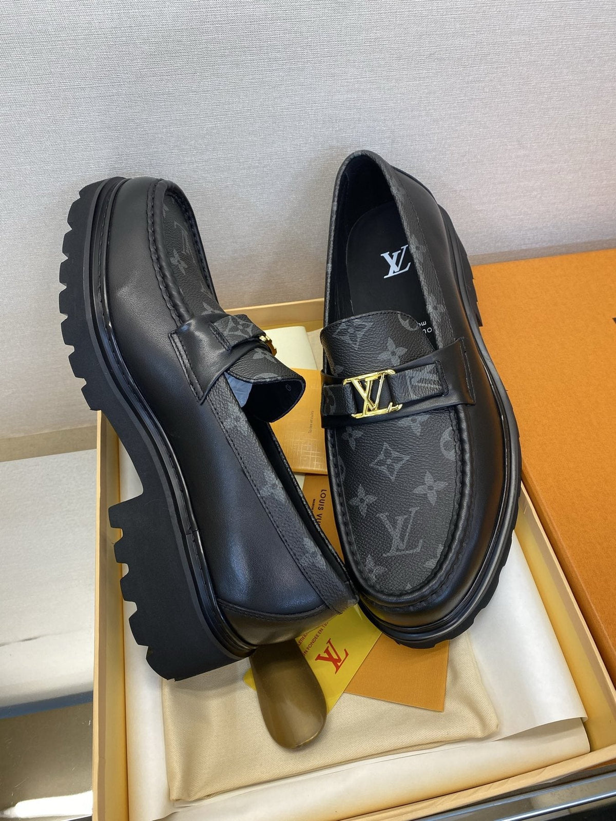 Louis Vuitton Men's Black Monogram Lug Sole Loafers - Moc-Toe Stitching